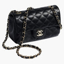 Bolso de colgajo chanel mini negro