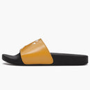 Un bañador de sandalias de diapositivas universitarias de simio amarillo