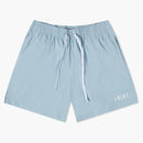 AMIRI Core logo pantalones cortos de natación de natación azul polvoriento