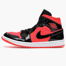 Jordan 1 Mid Hot Punch Black (women's)