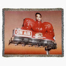 Beyonce en la manta tejida de la cartelera de aire