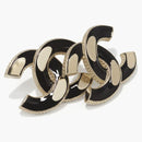 Pendientes de entrelazamiento de Chanel negro/dorado