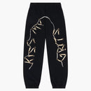 Lágrimas de mezclilla pantalones de chándal con hueso de pollo negro