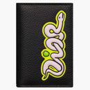 Dior x kaws titular de la tarjeta plegal vertical de piel de becerro de grano negro