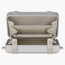 Osobní spojka Dior X Rimowa na hliníku na popruh