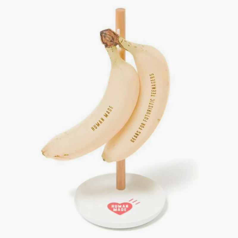 Mänskligt gjord bananreplika och stativ gul
