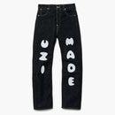 Pantaloni di denim fatti umani fatti in Indigo