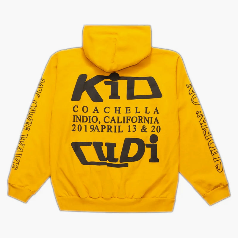 Kid Cudi plavat ve světlé mikině žluté