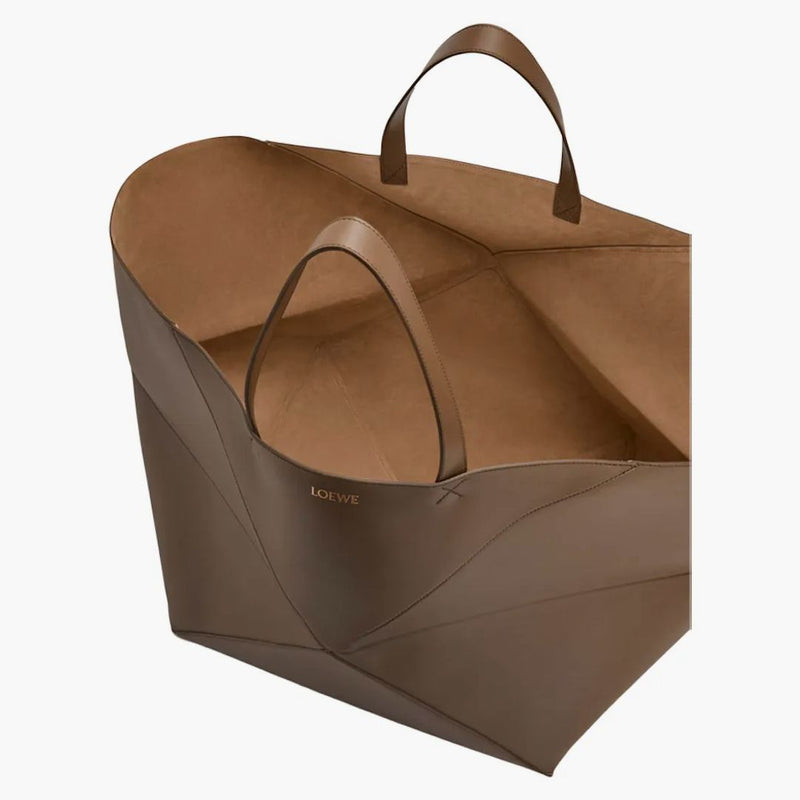 Puzzle loewe xxl piega morta in una pelle di vitello luccicante