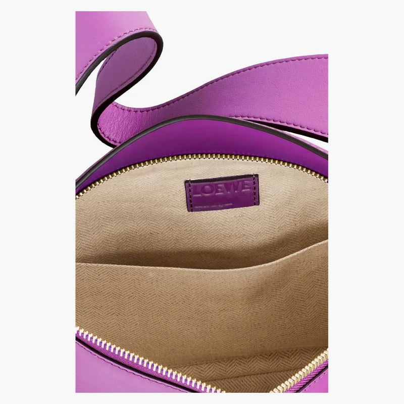 Sacca di hobo puzzle loewe in panorama nappa viola luminoso