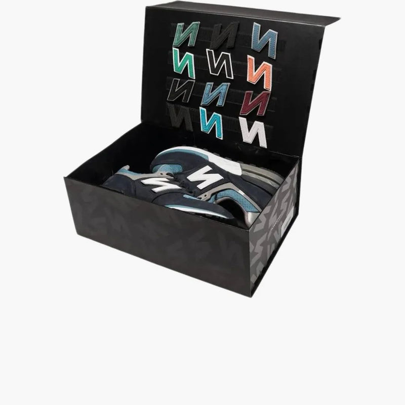 New Balance 574 Sport Ronnie Fieg X DSM Navy (speciální box)