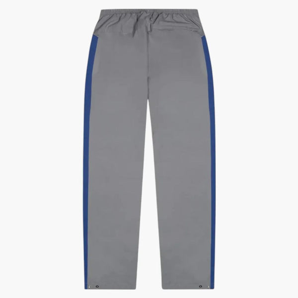 Nike x Patta nrg Track Pant (Asia Dimensing) částice šedá/safír