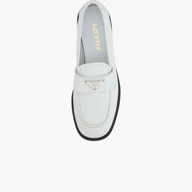 PRADA LOGO PLIGAQUE BRESTERA LOAFERS VIT LÄDER