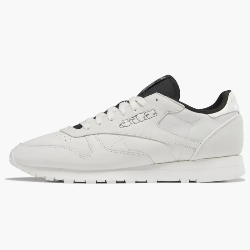 Reebok clásico de cuero estornudo negro blanco