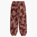 Supremo de suprador de leoparos blanqueado cardenal