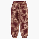 Supremo de suprador de leoparos blanqueado cardenal