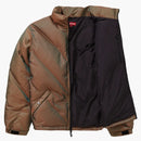 Suprema chaqueta hinchada iridiscente verde