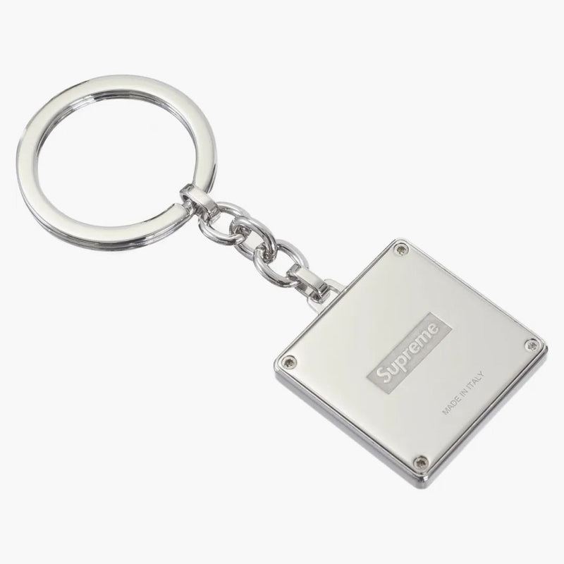 Llavero de rompecabezas supremo de plata