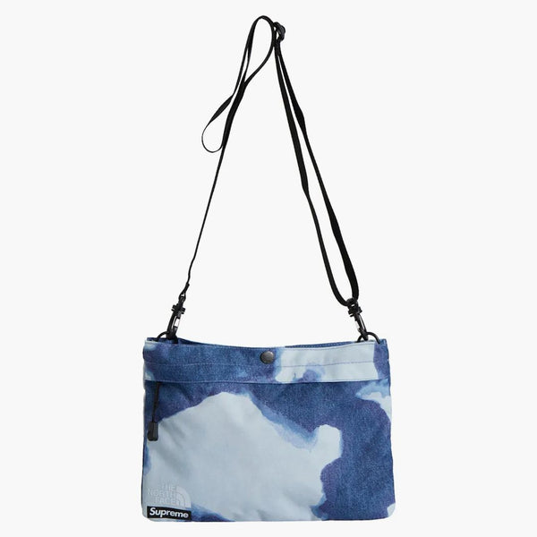 Nejvyšší na severní tváři Bleached Denim Print Ramenní taška indigo