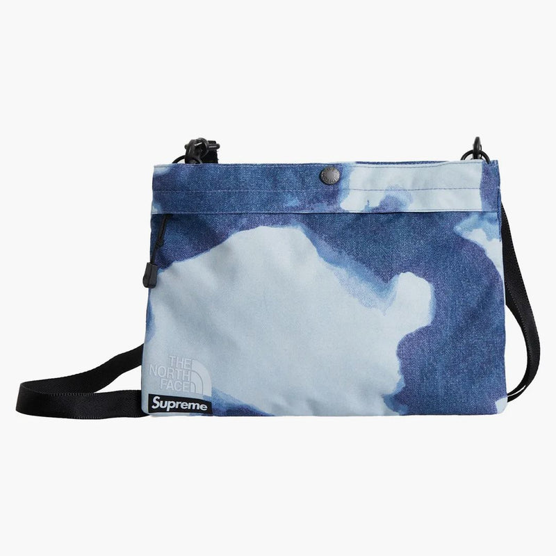 Nejvyšší na severní tváři Bleached Denim Print Ramenní taška indigo