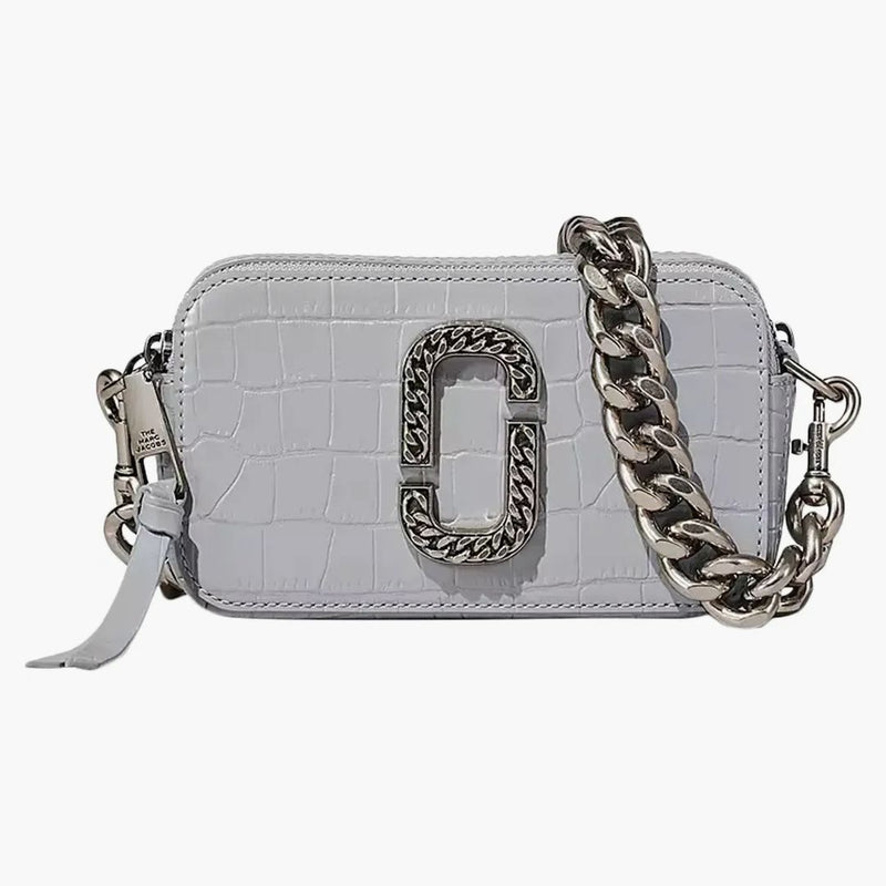 Marc Jacobs la cava di istantanea con crocce.