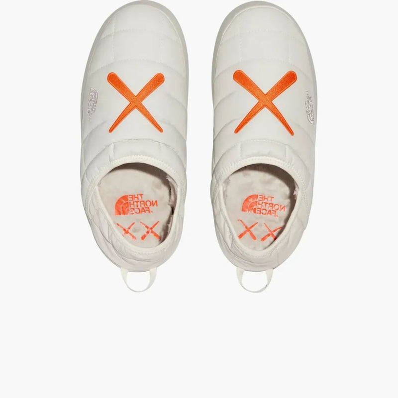 The North Face Thermoball Traction Mule Vs Kaws Moonlight Ivory Orange