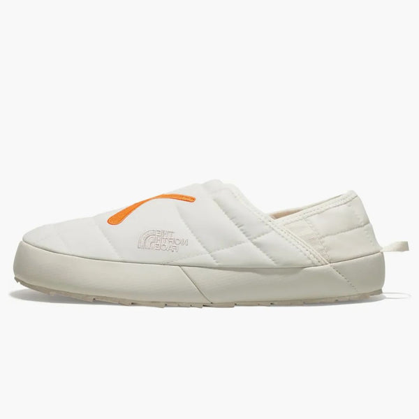 The North Face Thermoball Traction Mule Vs Kaws Moonlight Ivory Orange