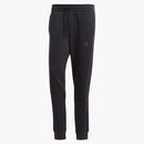 Adidas Essentials Fleece 3-Stripes Zužité manžetové kalhoty černé