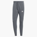 Adidas Essentials Fleece 3-pruhované kužely manžetové kalhoty tmavé šedé vřesy