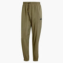 Adidas Essentials malé logo Stanford Tracksuit Bottoms Olive Stra/Black